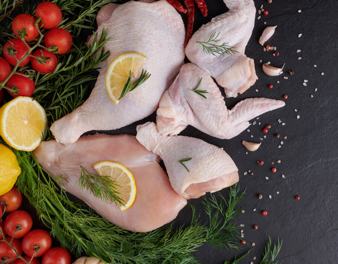 raw-chicken-fillet-with-garlic-pepper-rosemary-wooden-chopping-board-web